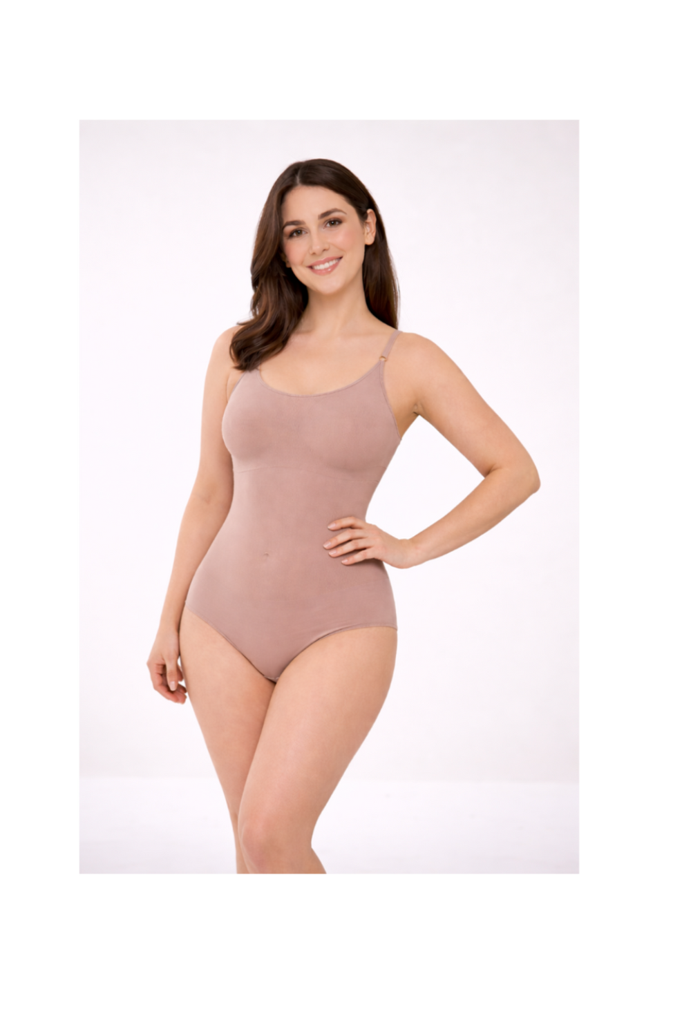 Woman wearing a beige bodysuit on a white background
